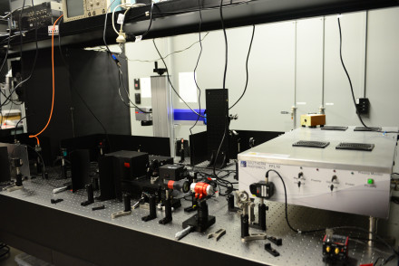 Ultrafast laser system with precision optical components